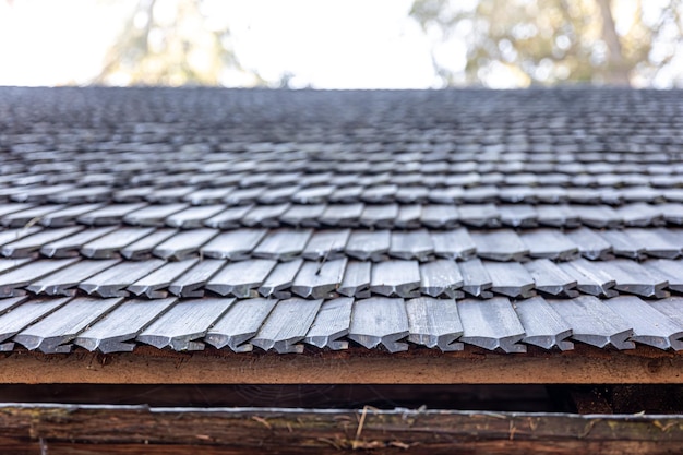 Closeup the roof of a house made of wooden tiles