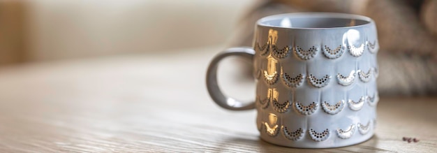 Free photo closeup shiny gray cup on a blurred background copy space