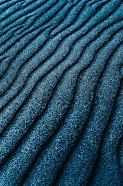 Free photo closeup shot of a blue colored sand dunes on a beach