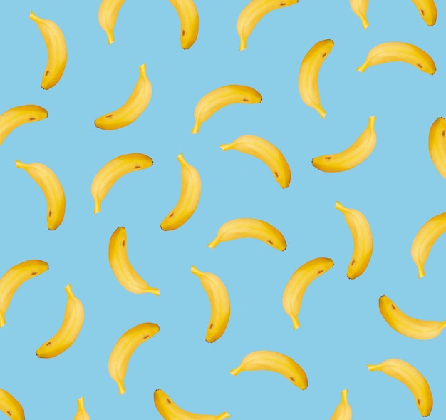 Closeup shot of a blue surface with bananas on it