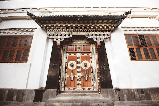 Free photo closeup shot of a building with big wooden doors