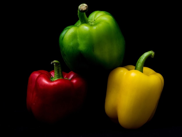 Free photo closeup shot of colorful peppers isolated