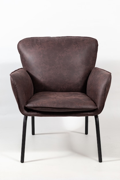 Closeup shot of a dark brown leather armchair