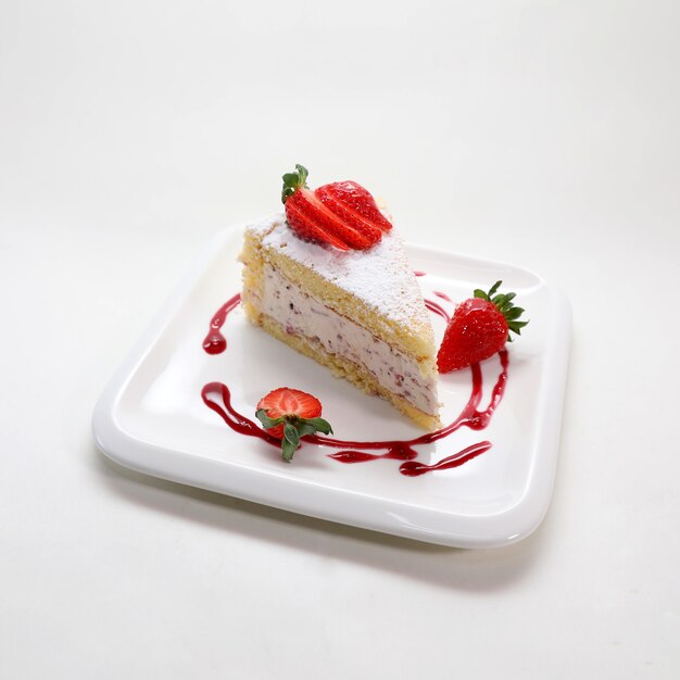 Closeup shot of a delicious strawberry cake in a plate