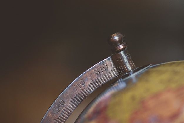 Closeup shot of a desk globe with a blurred background