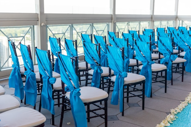 Free photo closeup shot of the elegant blue chairs in the wedding venue