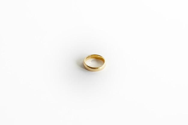 Closeup shot of a golden ring isolated on white background