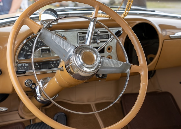 Free photo closeup shot of the interior of a car including the steering wheel