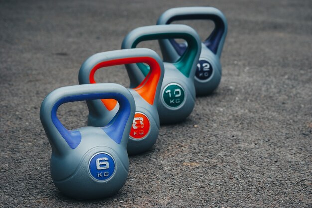 Closeup shot of kettlebells of varying weight