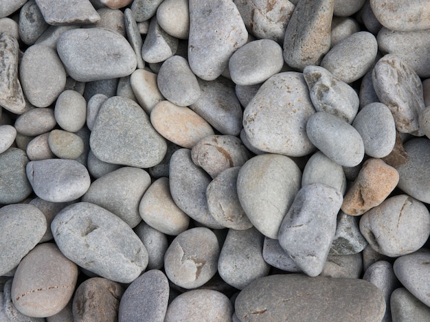 Free photo closeup shot of mixed beach pebble stones