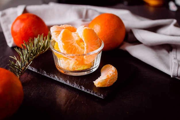 Closeup shot of peeled tangerines on the table