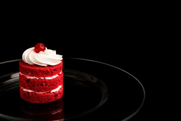 Closeup shot of a plate with a red velvet pastry