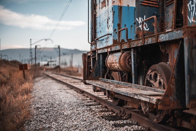 Closeup shot of a rusty old steam locomotive