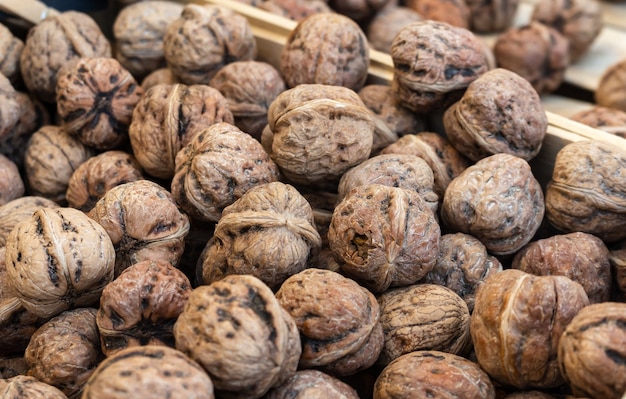 Closeup shot of several walnuts put on top of each other