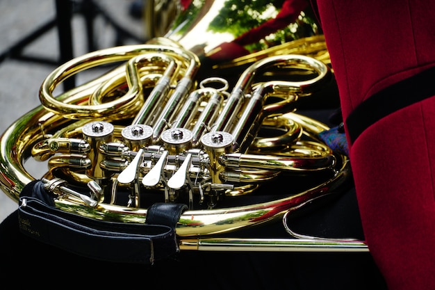 Free photo closeup shot of a shiny french horn