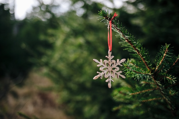 Free Photo closeup shot of a wooden flake on the christmas tree