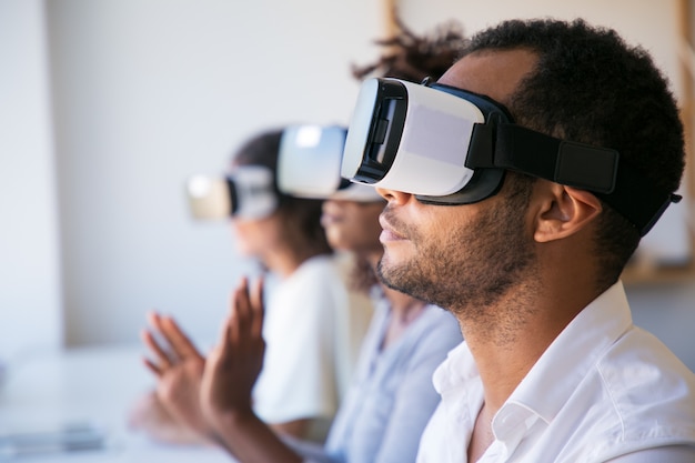 Closeup shot of young man testing virtual reality headset