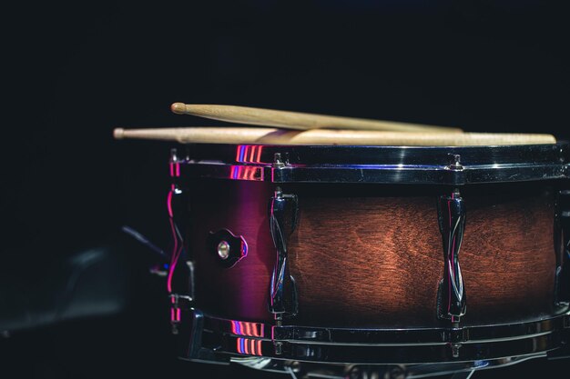 Closeup snare drum on a dark background isolated copy space