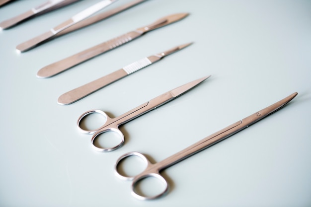 Free Photo closeup of surgery knives set isolated