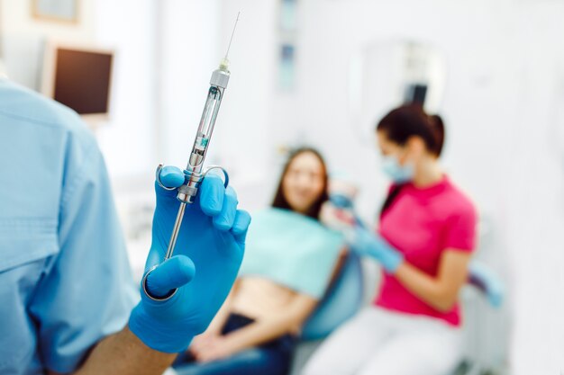 Closeup of syringe with anesthesia, dental clinic