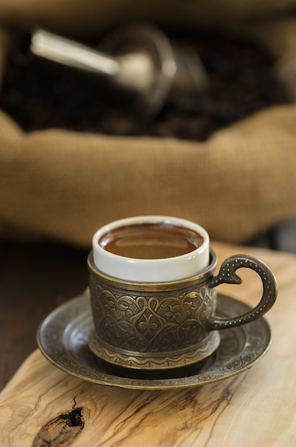 Free photo closeup of turkish coffee served in a traditional cup