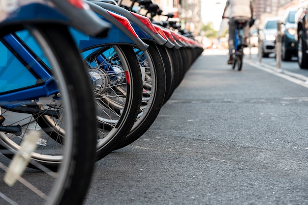 Closeup with bicycles and blurred urban background