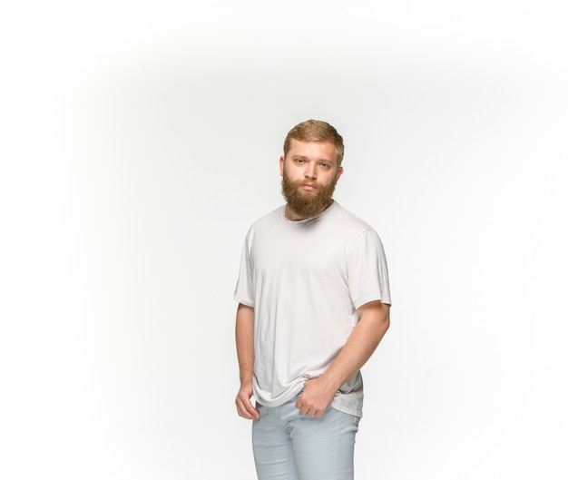 Free Photo closeup of young man's body in empty white t-shirt isolated on white space. mock up for disign concept