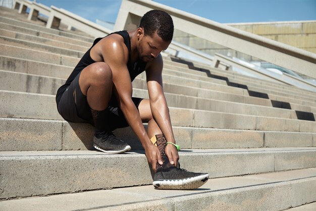 Closeup of young man with ankle injury