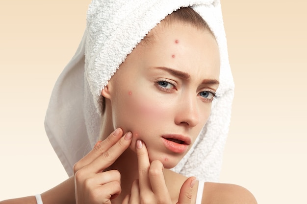 Free Photo closeup of young woman with towel on head