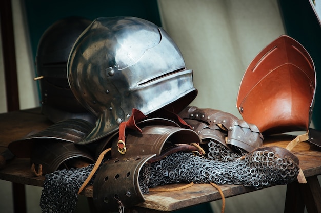 Free Photo clothing and tools of a medieval knight on the table