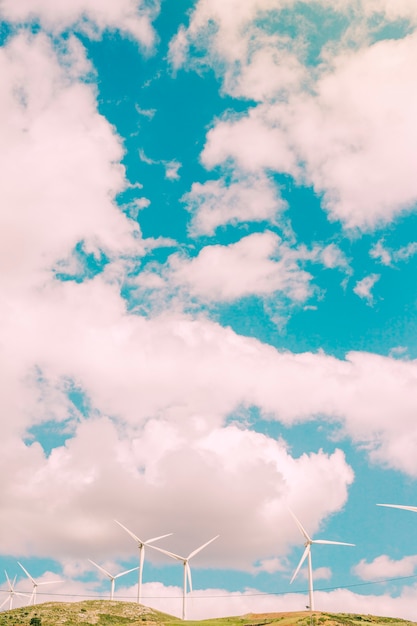 Free photo clouds over field