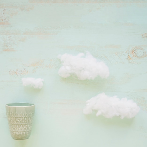 Free photo clouds and old antique glass on grunge textured