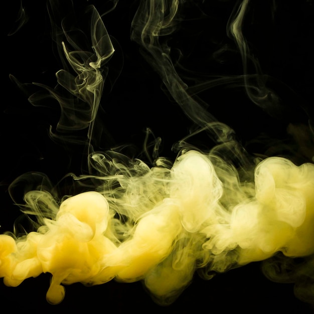 Free photo cloudy yellow smoke overlay on black background