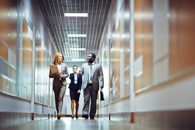 Co-workers in the corridor