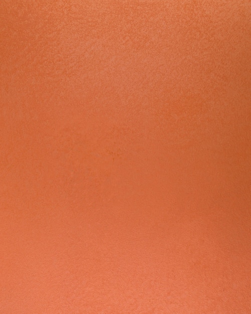 Free photo coarse orange concrete wall surface