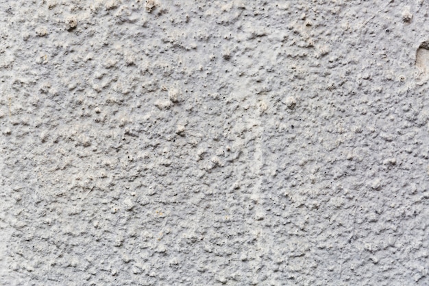 Free photo coarse textured cement wall