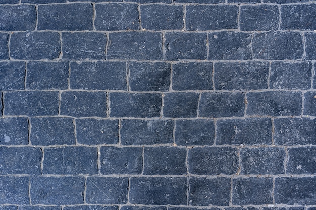 Free Photo cobblestone pavement road with edge courses at the sidewalk texture