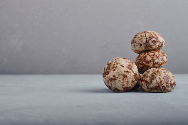 Cocoa gingerbreads isolated on grey background. 