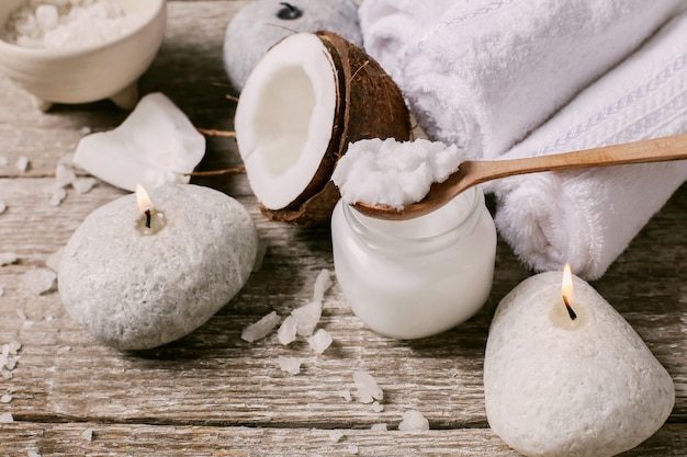 Coconut oil, candles and towels