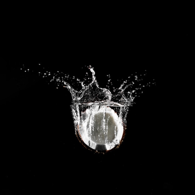 Coconut plunging into the water