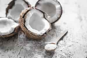 Free photo coconut on wooden background