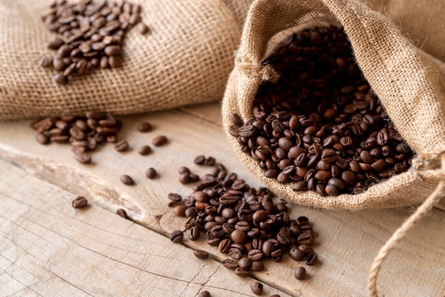 Coffee beans in burlap sack high view