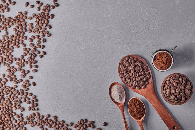 Coffee beans isolated on blue background.