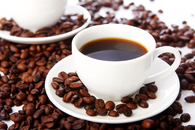 Coffee beans with white cups