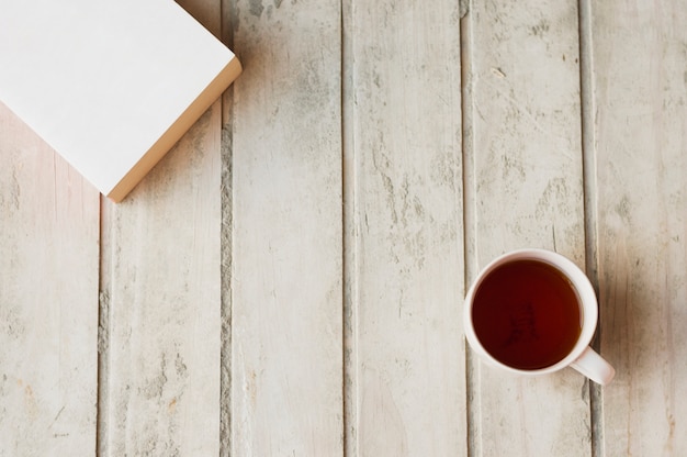 Free Photo coffee and book on table