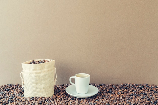 Free Photo coffee concept with bag next to cup