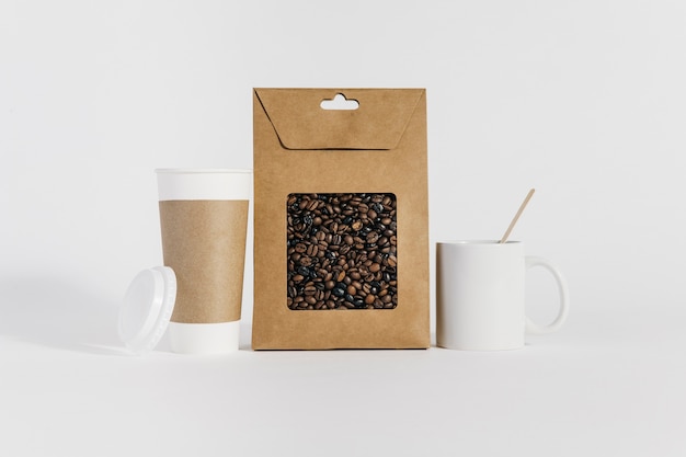 Free Photo coffee concept with bag, mug and cup