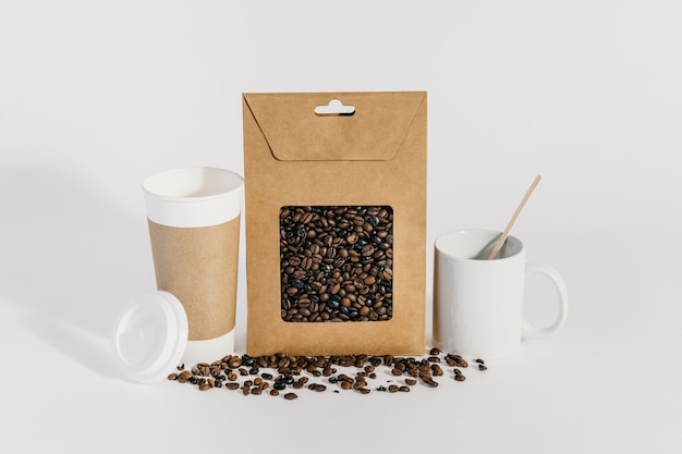 Free Photo coffee concept with bag and take away cup