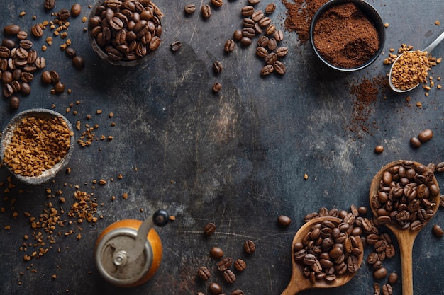 Coffee concept with differents types of coffee coffee beans milk and cinnamon sticks on grey background Flat lay