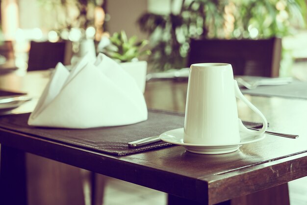 Coffee cup at the restaurant's table